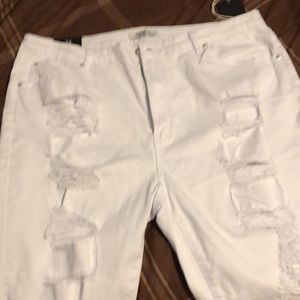 A pair of shorts and short outfit with mask